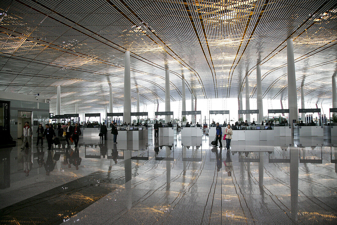 People at the arrival hall of the International Airport Beijing, largest building in the world, Peking, China, Asia