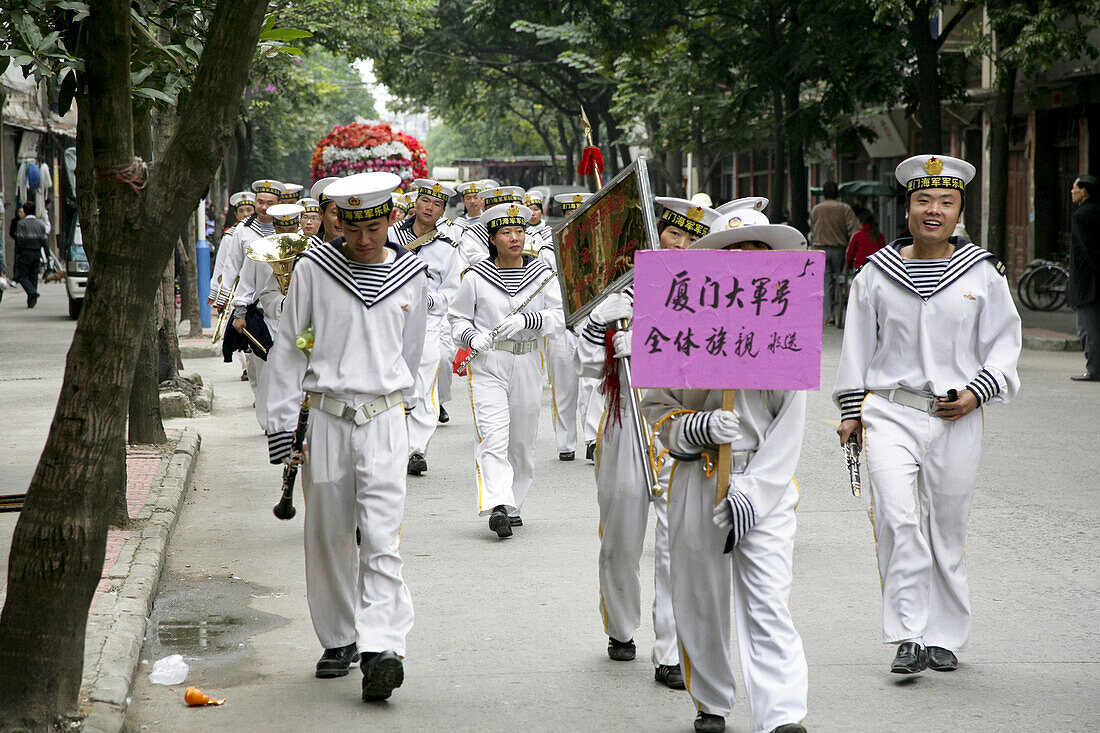 Seamen at a mourning procession on the street, Jinfeng, Changle, Fujian province, Jinfeng, Changle, FujianChina, Asia