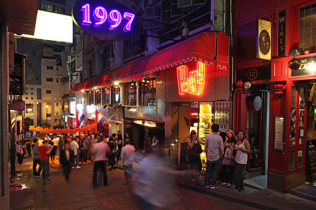 People on the street in front of a bar, Lan Kwai Fong, Hongkong, China, Asia