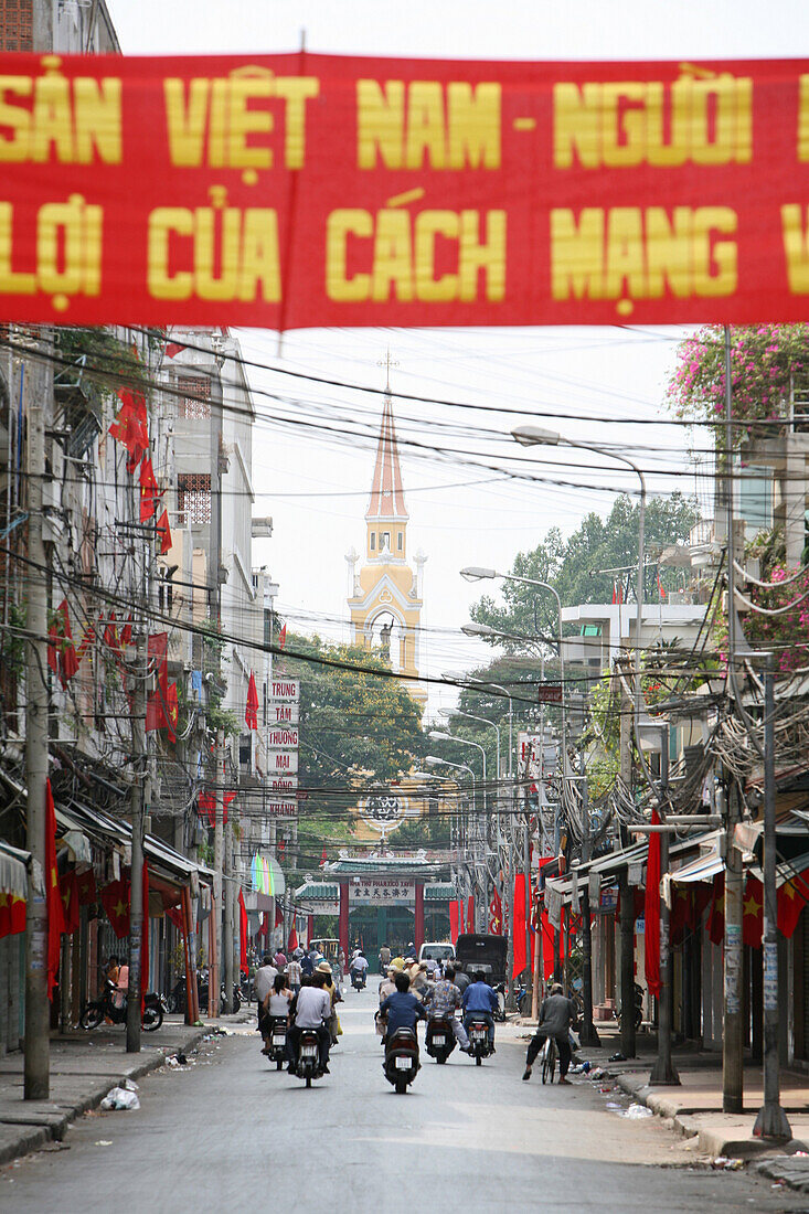 political banner and Vietnamese flags New Year festival, Tet, in a street, Cholon quarter, Saigon, Vietnam, Vietnam, Asia
