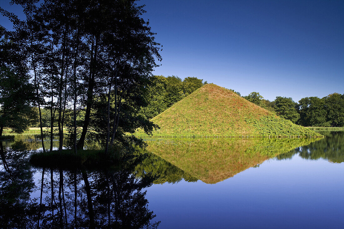 Pyramid in the Pyramide Lake in the grounds of Branitz castle, Fürst Pückler Park near Cottbus, Brandenburg, Germany, Europe