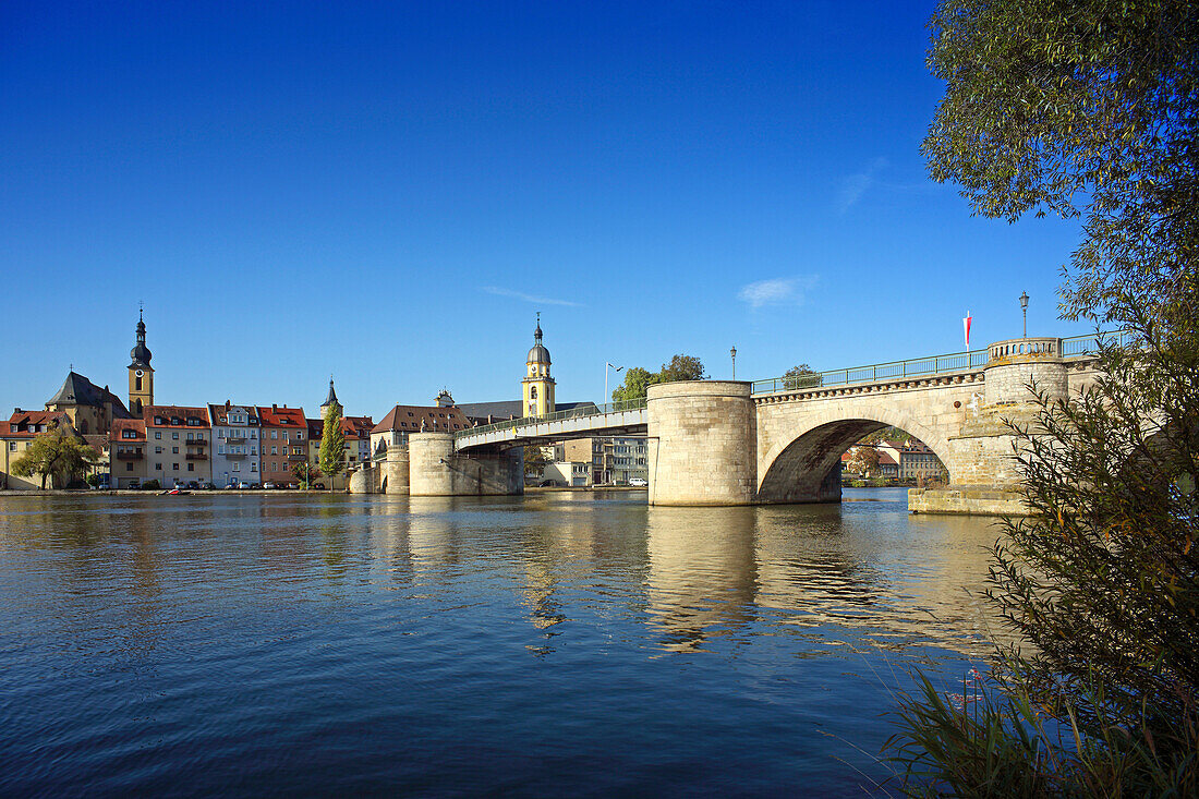 View over Main river with Old Main Bridge, Kitzingen, Franconia, Bavaria, Germany