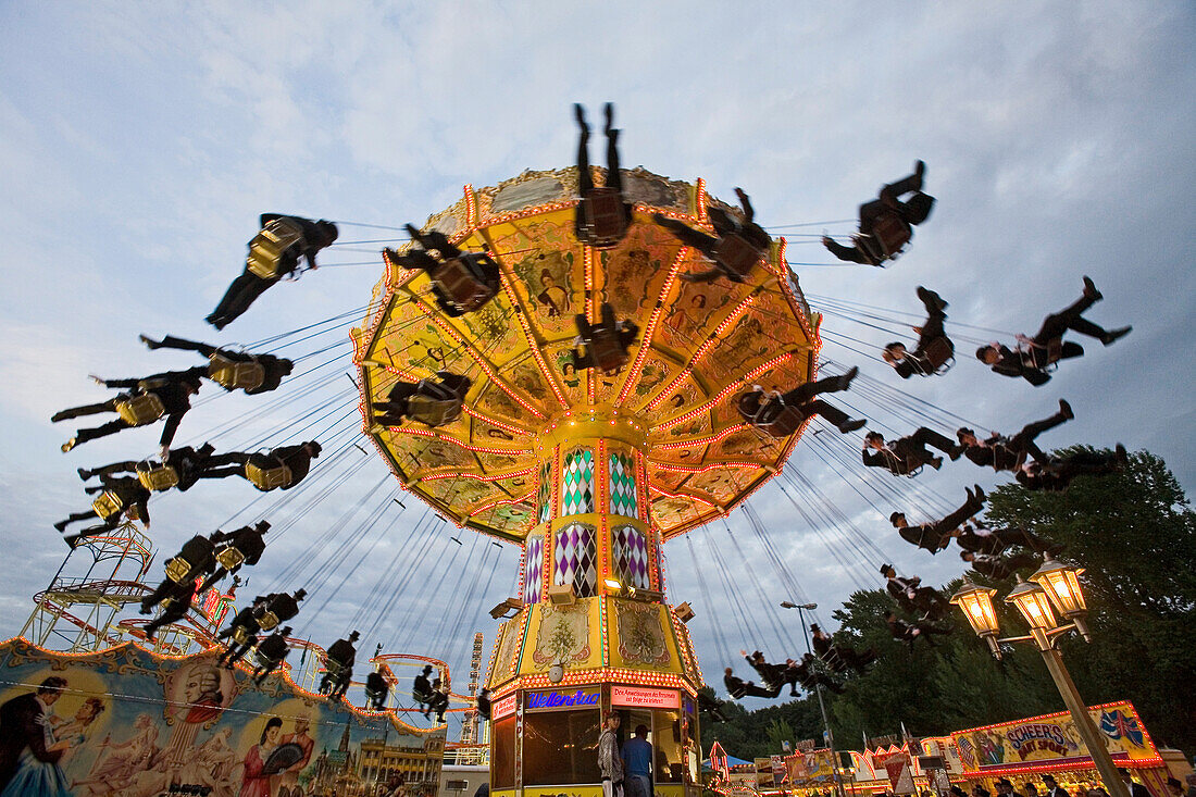 Bruchmeister or traditional guards, in top hats, at Hanover's Schutzenfest, carousel, Hanover, Lower Saxony, northern Germany