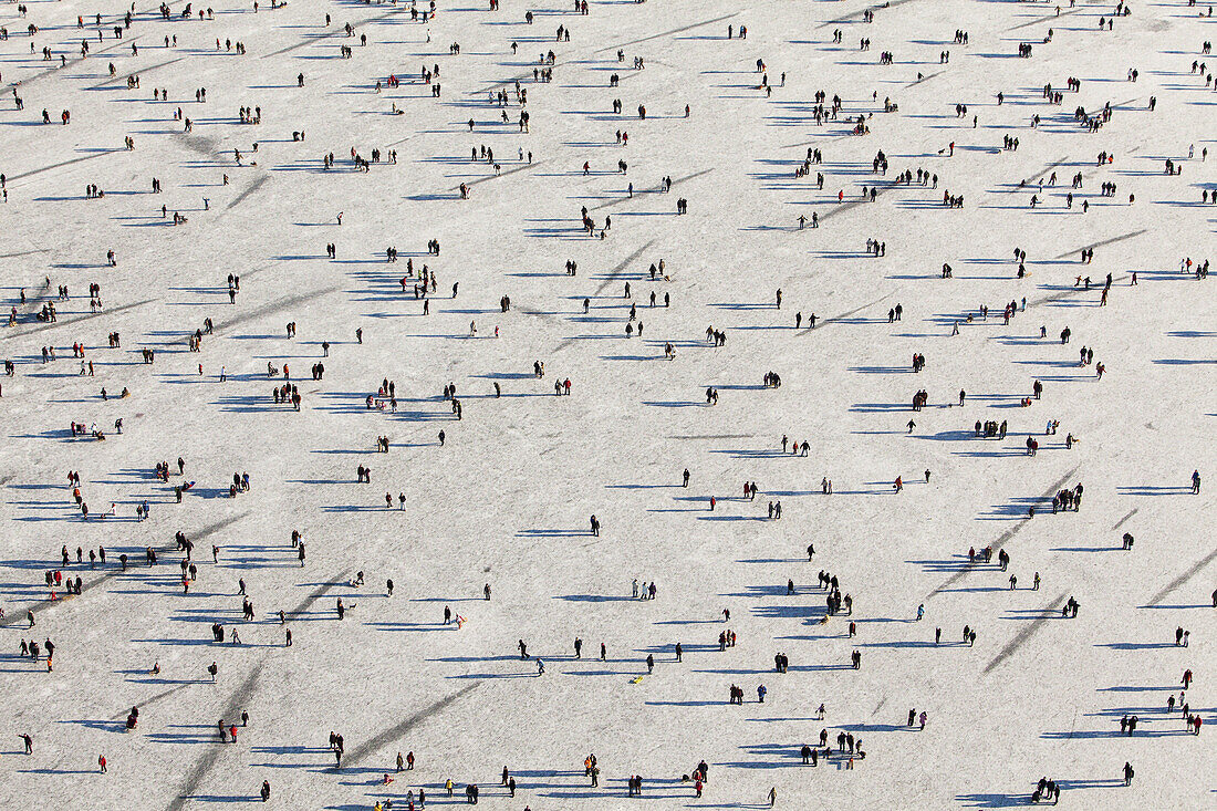 Ice skaters on lake Machsee, Hanover, Lower Saxony, Germany