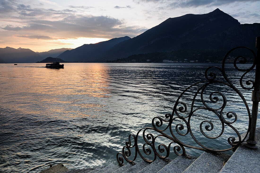 Stairs with wrought-iron balustrade at Lake Como, Lombardy, Italy