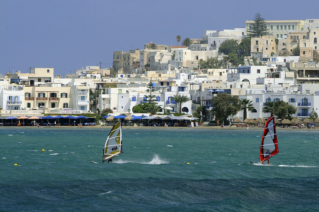 Sailboarders in front of the town of Naxos, island of Naxos, the Cyclades, Greece, Europe