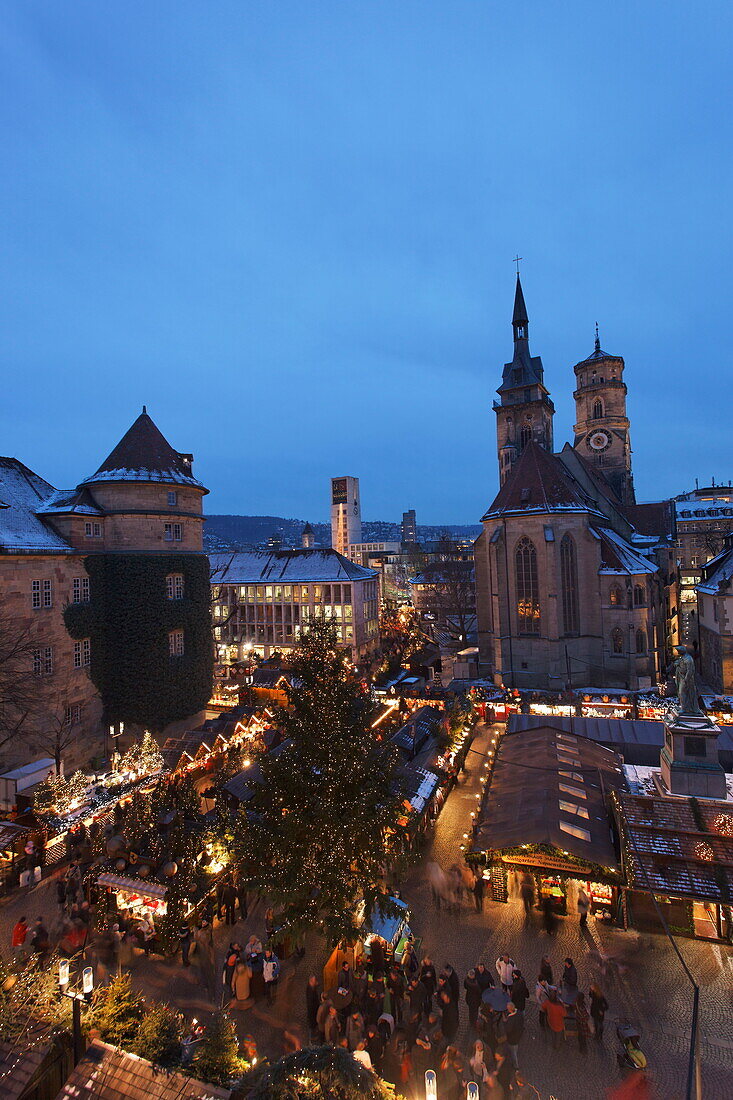 Christmas market at Schiller square, Old Castle and Collegiate Church in background, Stuttgart, Baden-Wurttemberg, Germany