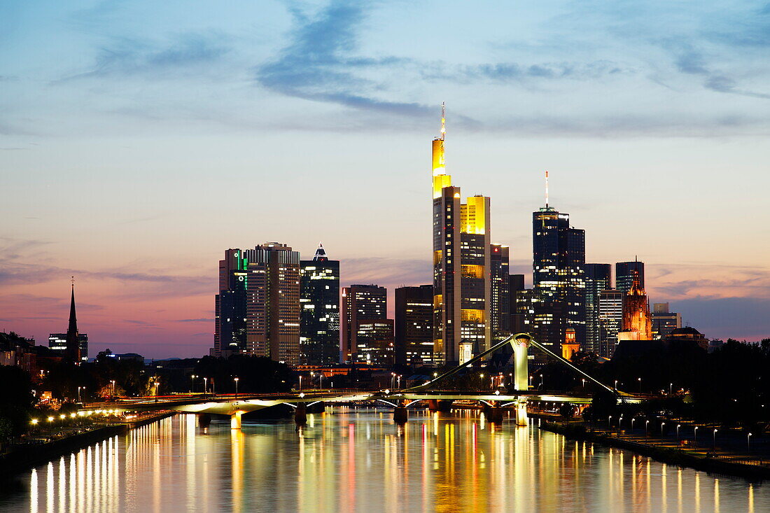 View over river Main with bridge to skyline, Frankfurt am Main, Hesse, Germany