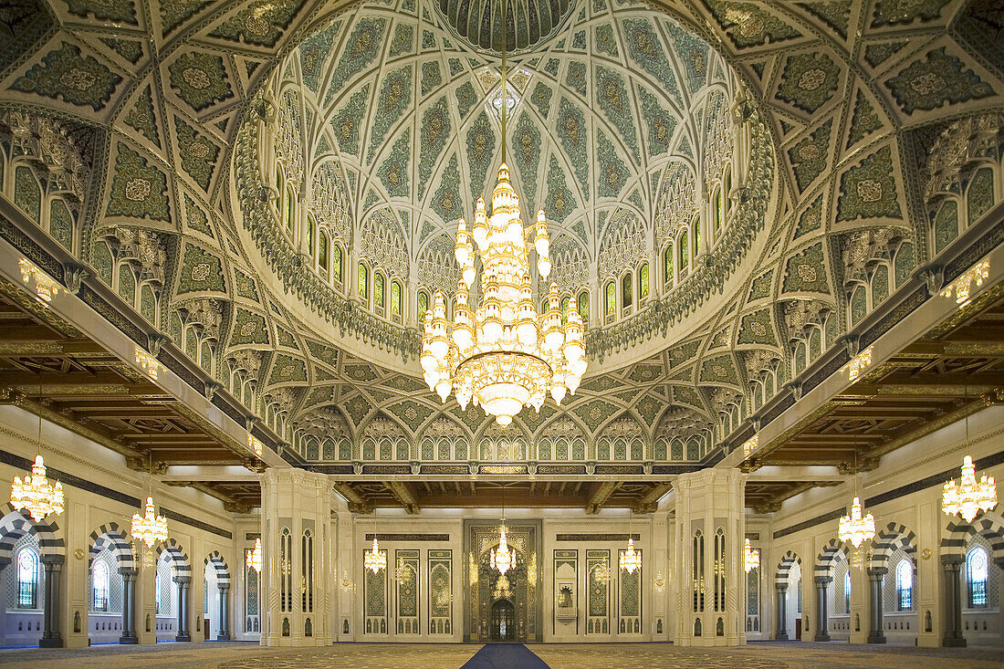 Architectural detail of the interior of the main prayer hall of the Sultan Qaboos Grand Mosque,  with the world´s largest Swarovski Crystal chandelier,  hanging from the domed ceiling,  Ghubrah,  Muscat,  Oman