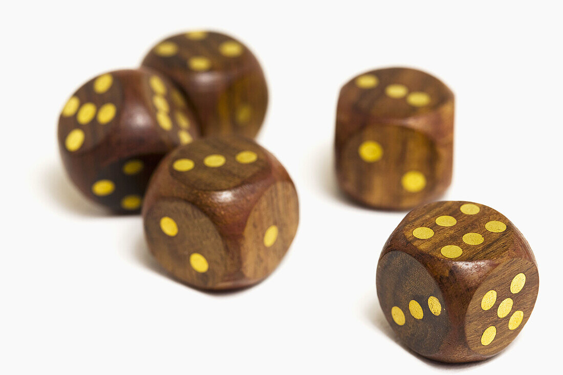 Wooden dice against white background