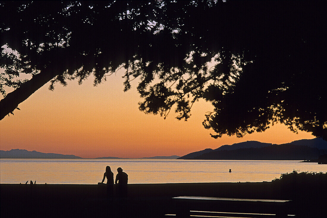 sunset viewed from Ambleside Beach Park,  West Vancouver,  British Columbia,  Canada