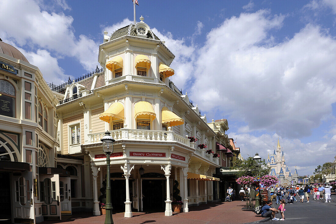 Store with yellow awnings along Main Street at Walt Disney Magic Kingdom Theme Park Orlando Florida Central