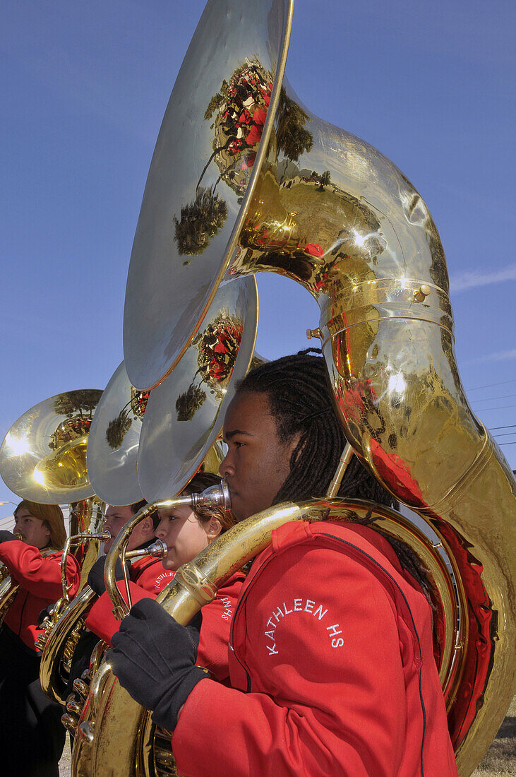 African American High School Band Member plays tuba at Strawberry Festival Parade Plant City Florida