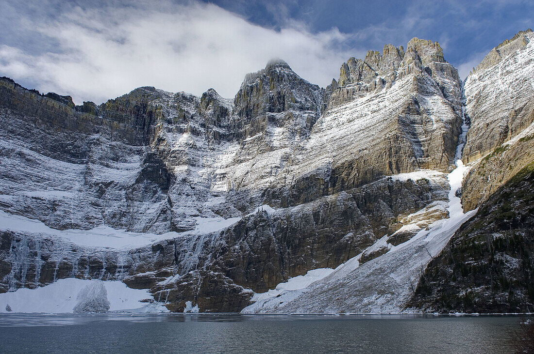 Fresh autumn snow on Iceberg Peak 2788 m 9147 ft above Iceberg Lake,  Glacier National Park Montana USA