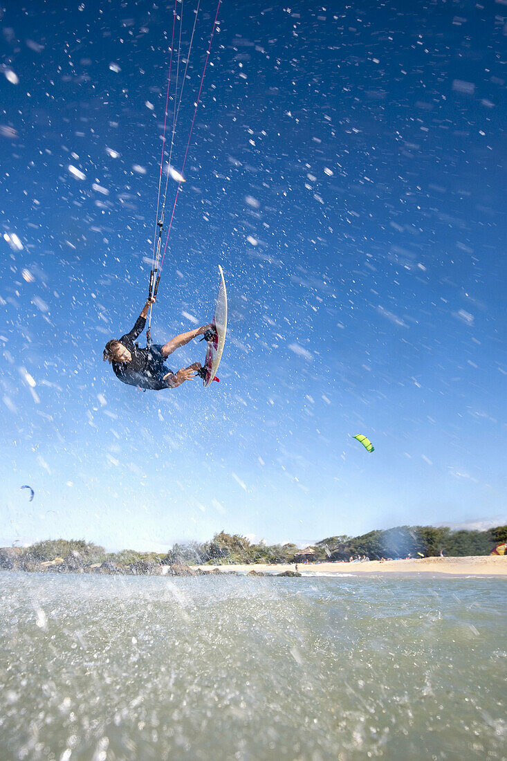 Man kiteboarding in Maui,  Hawaii