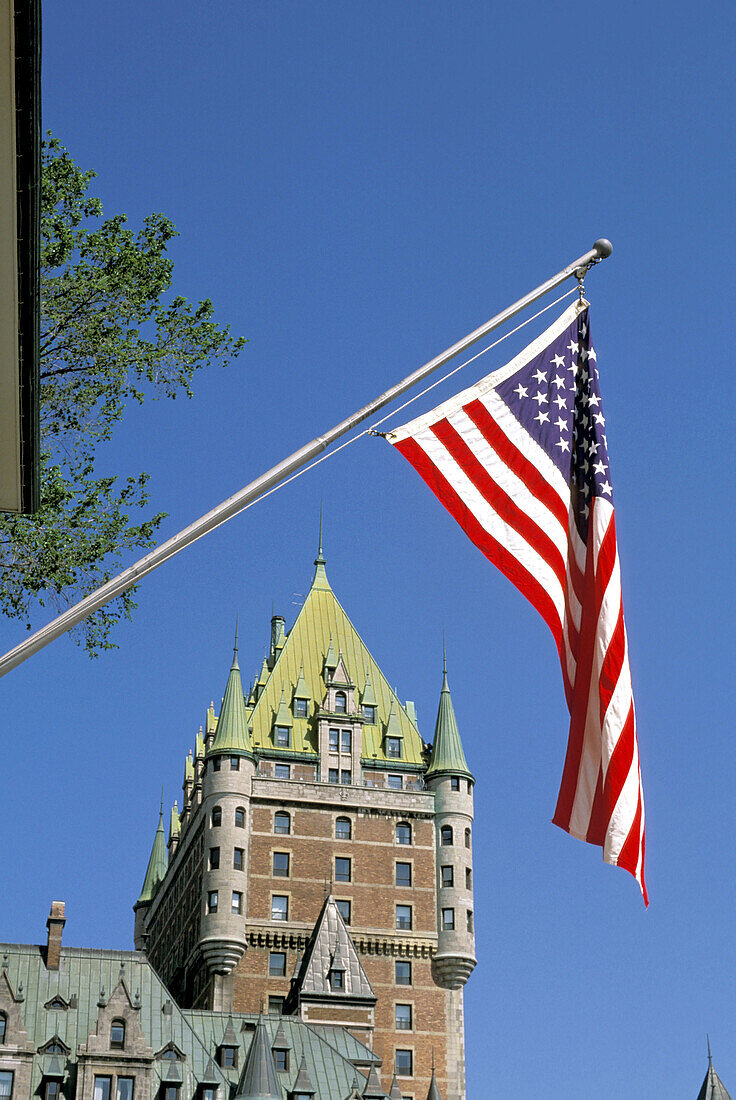 View of the Chateau Frontenac framed by the American flag,  Quebec City,  Quebec,  Canada