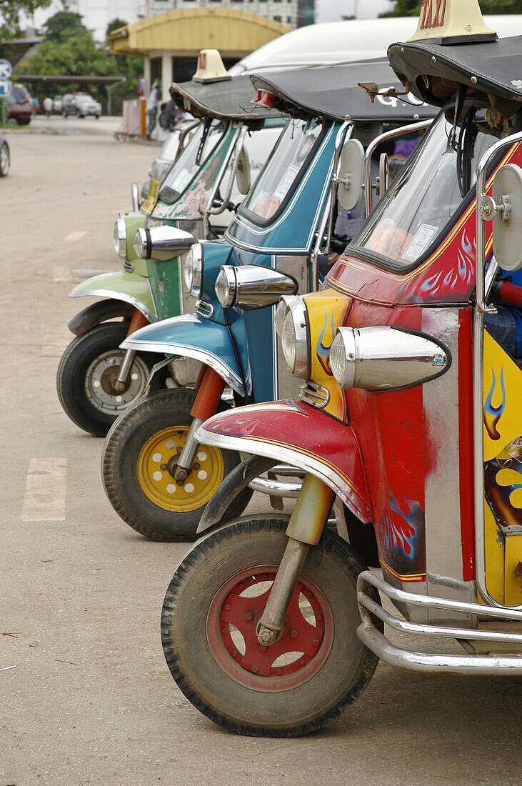 Tuk Tuks waiting for riders Amphoe Aranyaprathet, Thailand