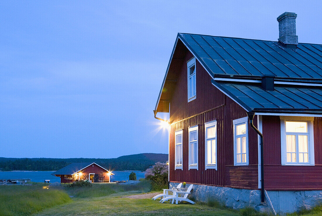 Finland,  Aland Island Silverskär,  private island Wood house at summer night