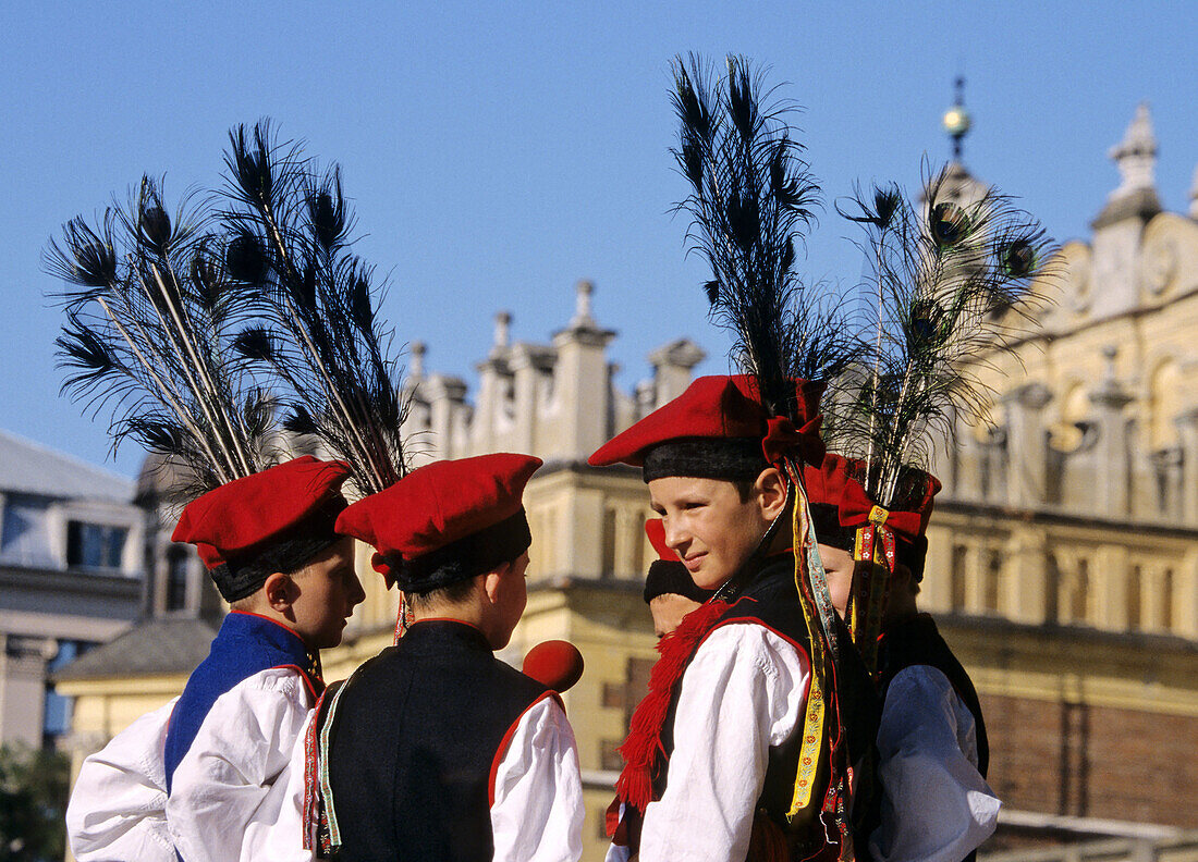 Poland Krakow Boys at folk dance festival at Main Market Square