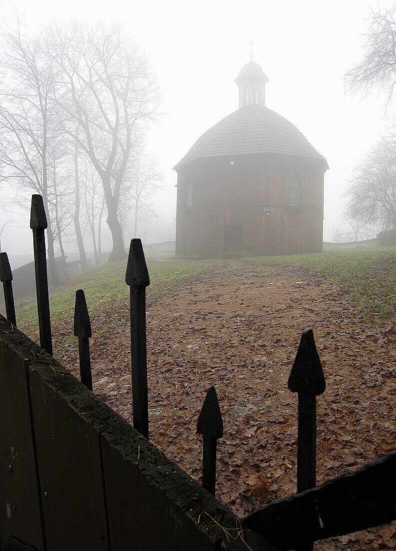 Poland,  Krakow,  Wooden old Chapel of St Margaret at Salvator at fog