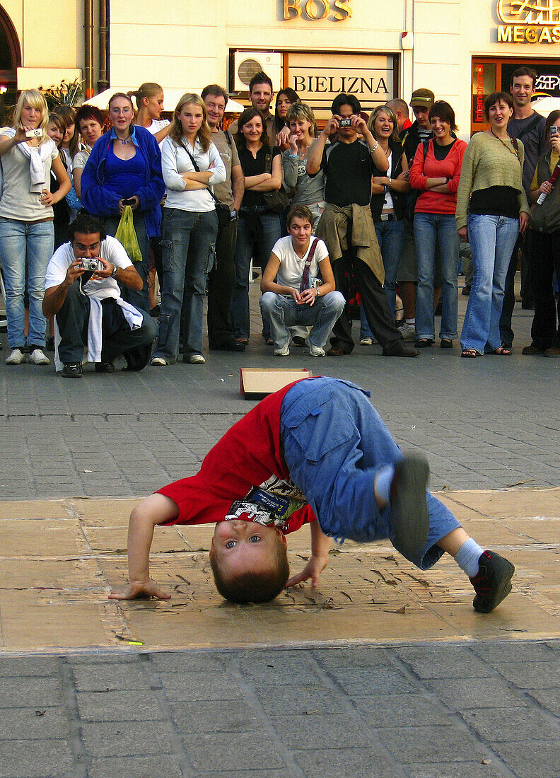 Brakedance,  street performance at Mian Market Square,  Krakow,  Poland