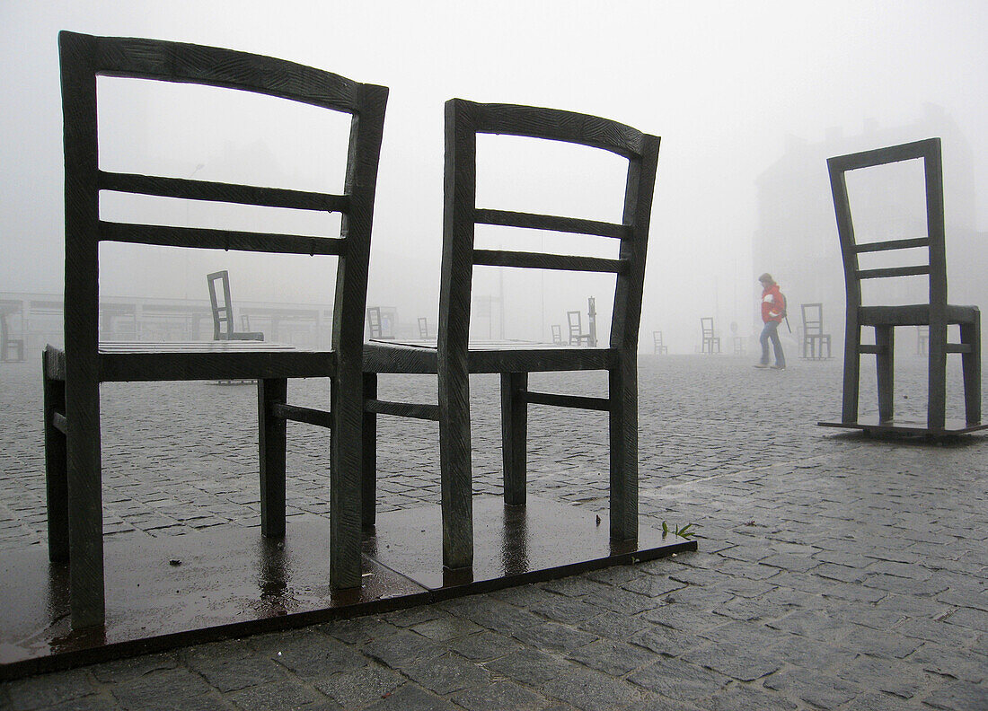 Poland,  Krakow,  Podgorze district,  Memorial to the heroes of the Krakow ghetto,  metal chairs