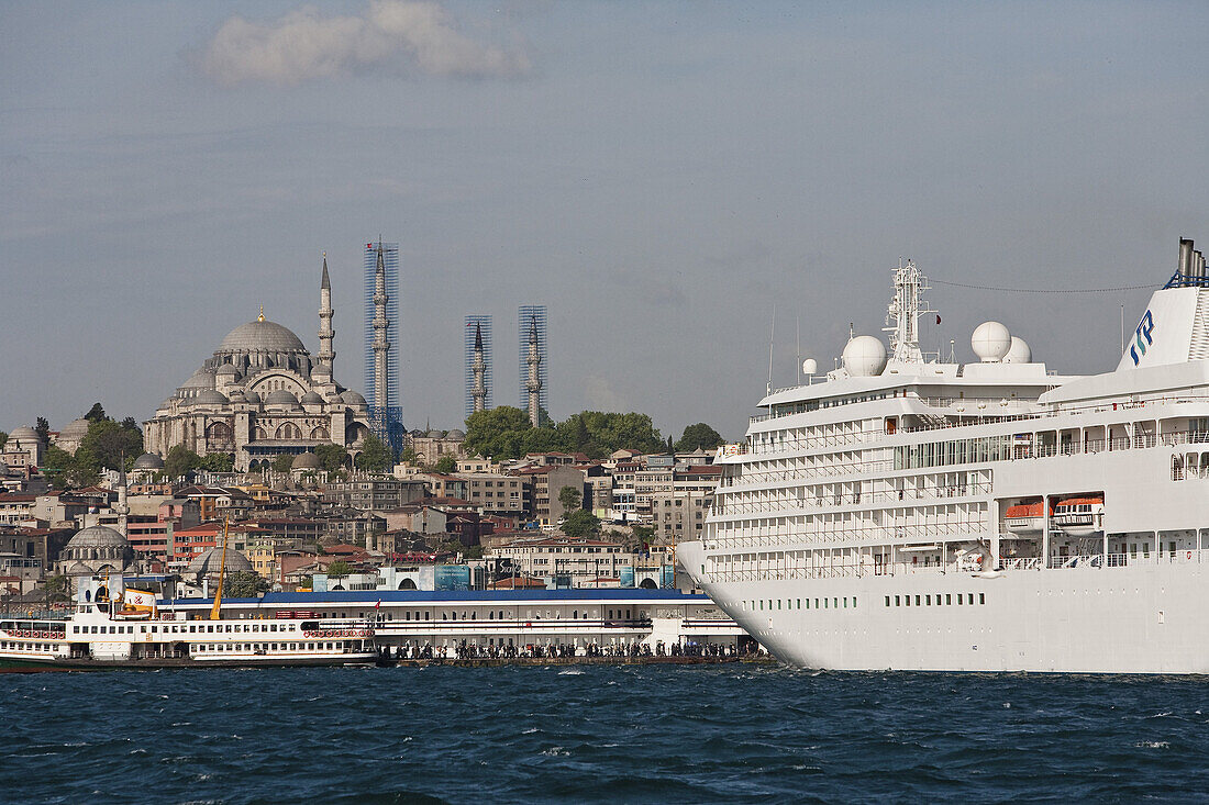 cruise ship on the harbour, Blue Mosque in the background, Istanbul, Turkey