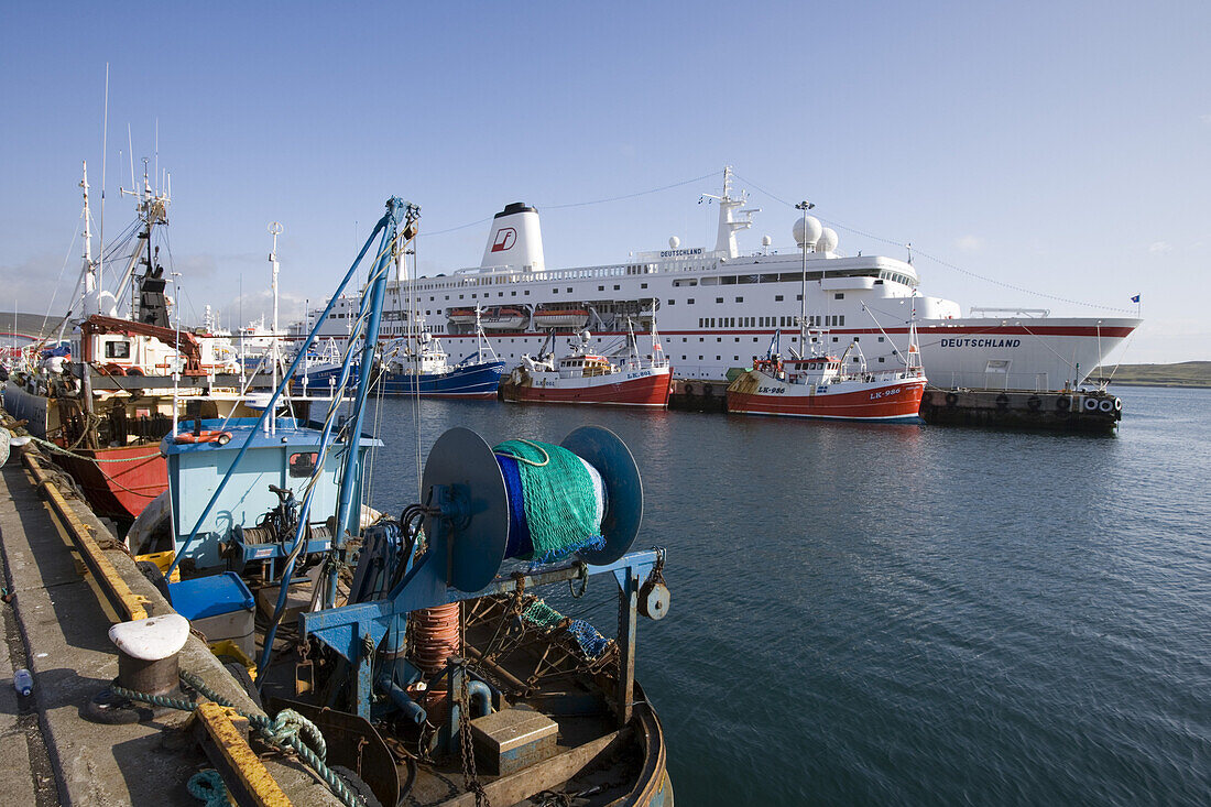 Fishing boats and cruise ship MS Deutschland at harbour, Lerwick, Mainland, Shetland Islands, Scotland, Great Britain, Europe