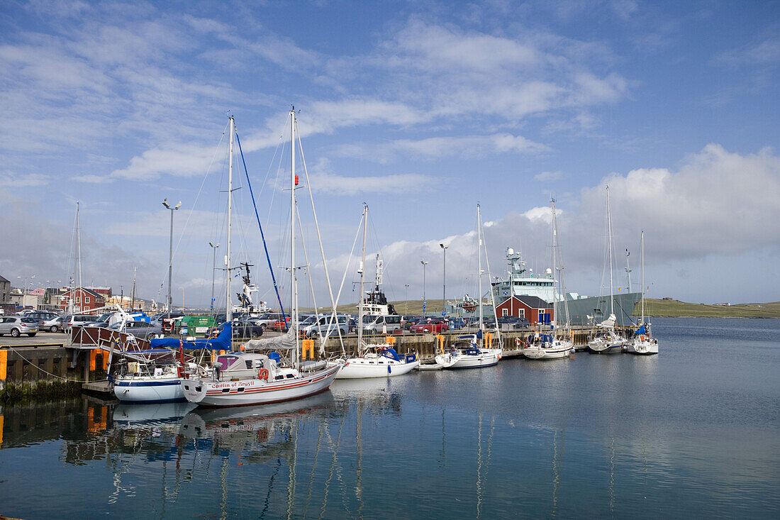 Sailing boats alongside jetty at harbour, Lerwick, Mainland, Shetland Islands, Scotland, Great Britain, Europe