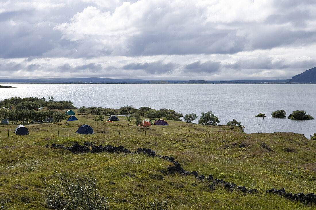 Camping site at Lake Myvatn under clouded sky, Nordurland Eystra, Iceland, Europe