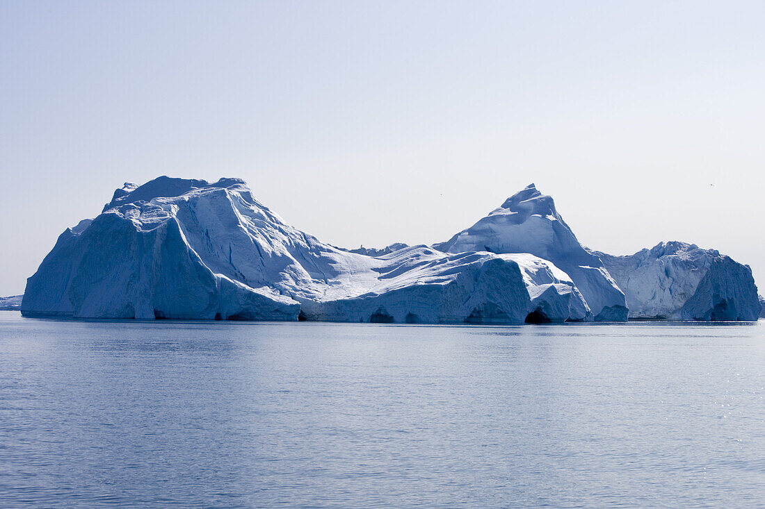 Icebergs of Ilulissat Kangerlua Isfjord in the sunlight, Disko bay, Kitaa, Greenland