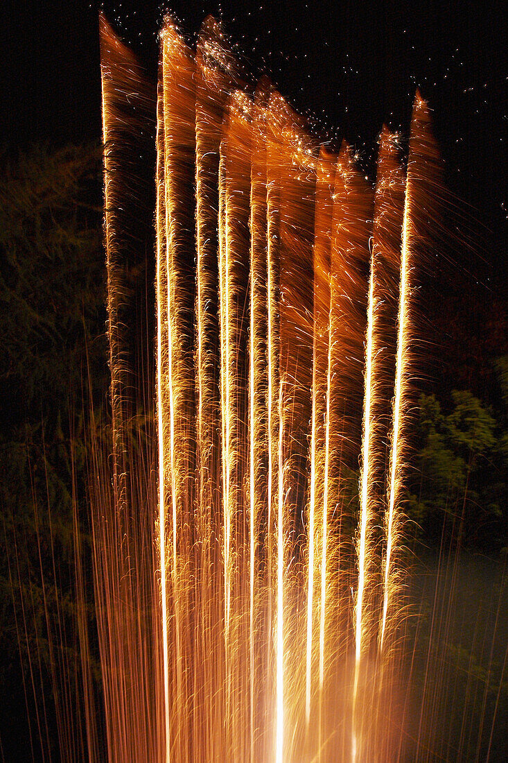 Launching fireworks at night