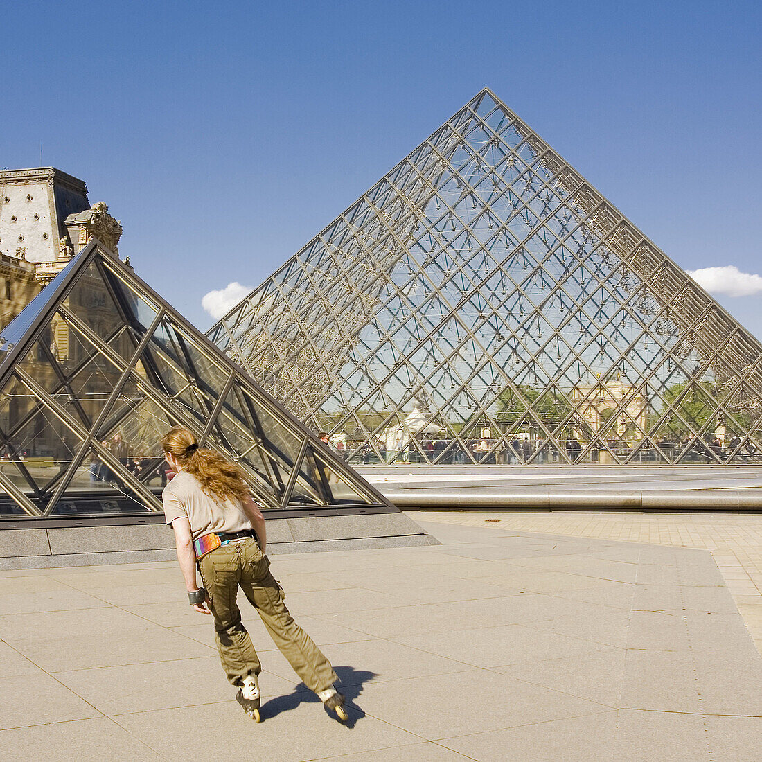 The new entrance to the Musee du Louvre,  a pyramidal,  glass structure designed by renowned American architect I M Pei  Paris,  France