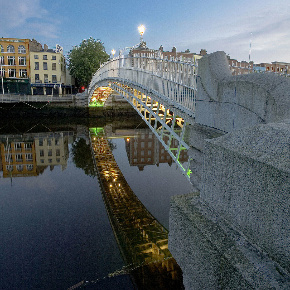 Ireland,  Dublin,  Half Penny Bridge reflected in River Liffey