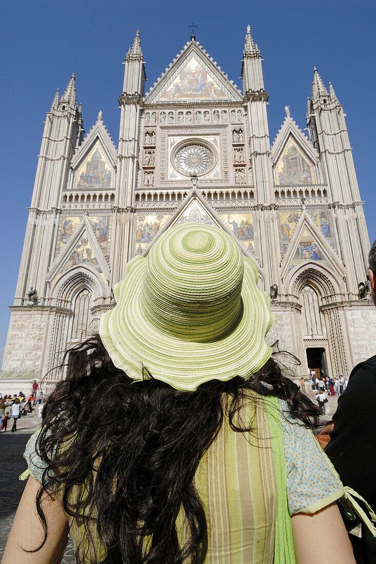 Orvieto Umbria Italy Visitor takes in the view of the Duomo,  Piazza del Duomo