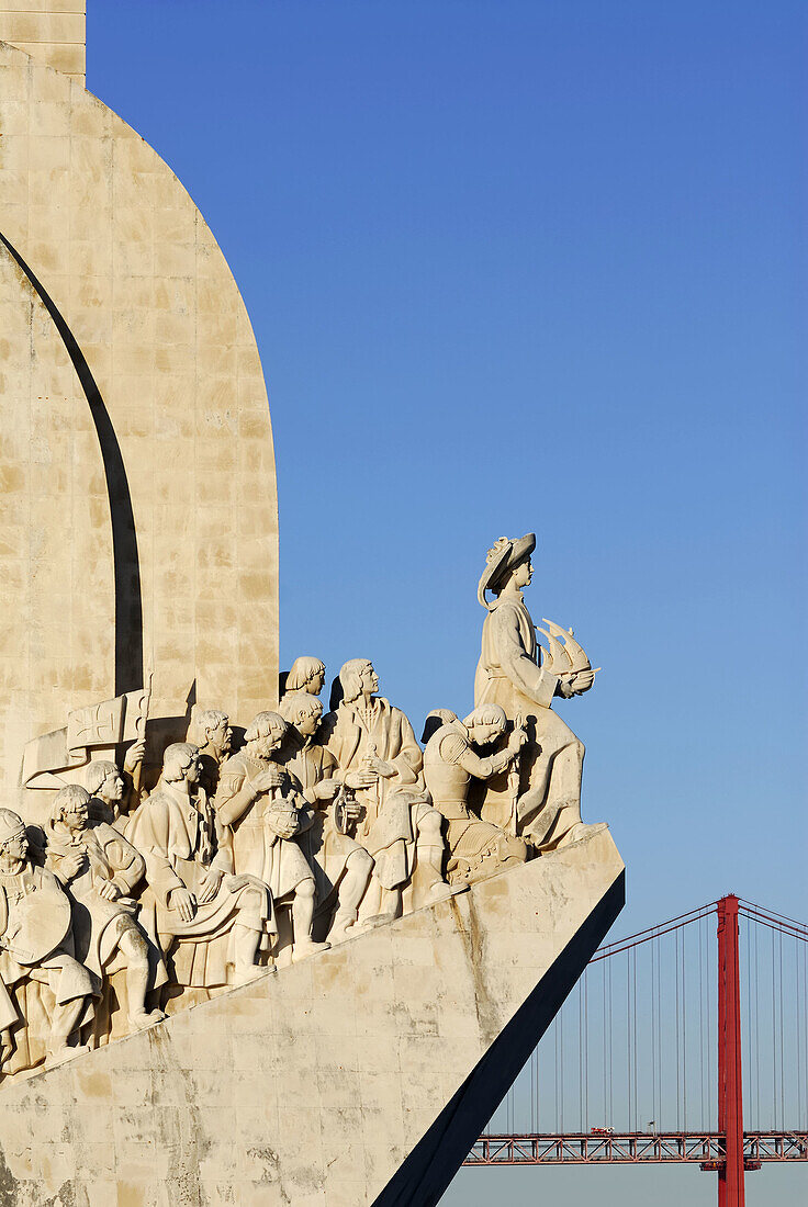 Lisbon Portugal Henry the Navigator stands at the prow of the Monument to the Discoveries Padrao dos Descobrimentos in Belem,  the Ponte 25 de Abril in the background