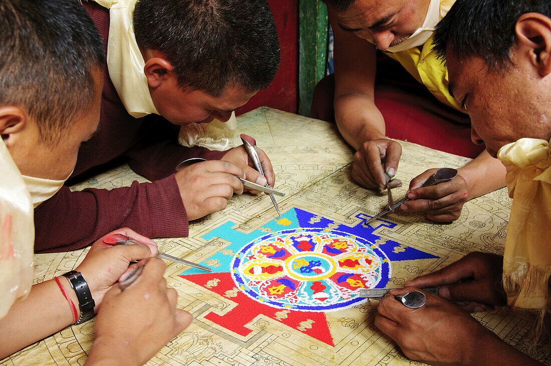 Monks making a sand mandala Lama Yuru Gompa,  Ladakh,  India