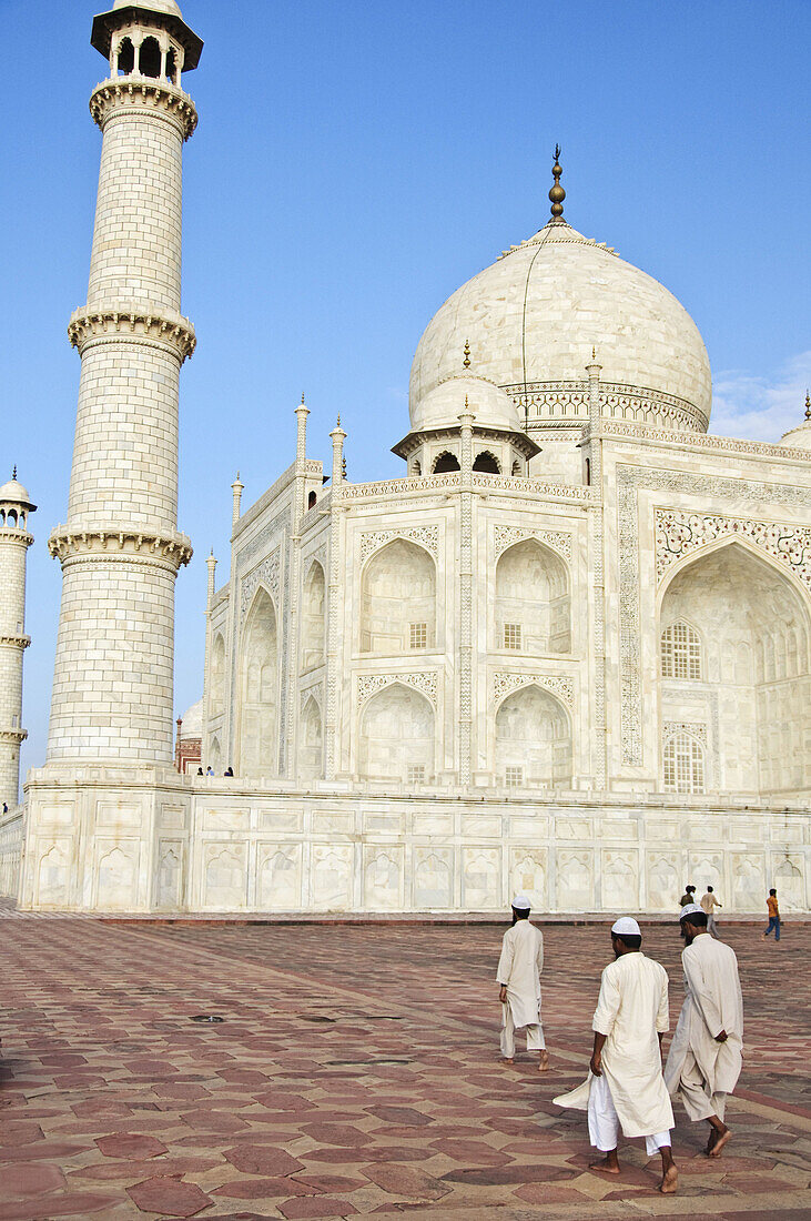 Muslim men walking infront of the Taj Mahal  Agra,  India