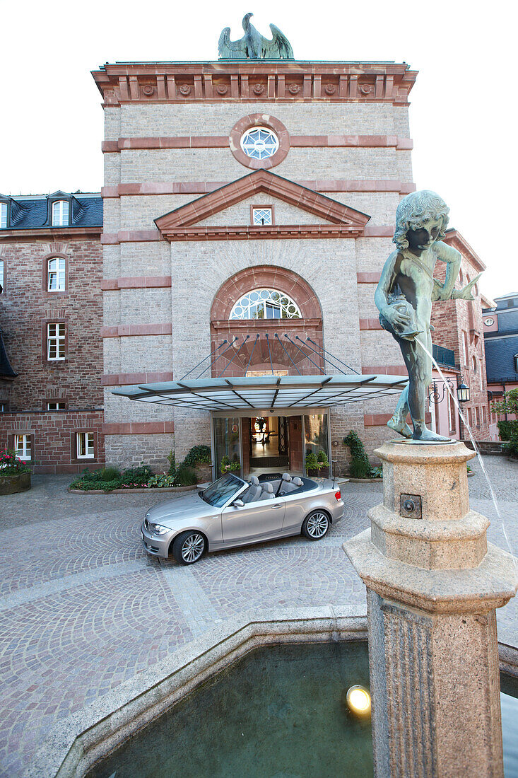 Convertible in front of Hotel Buehlerhoehe, Buehl, Black Forest, Baden-Wuerttemberg, Germany