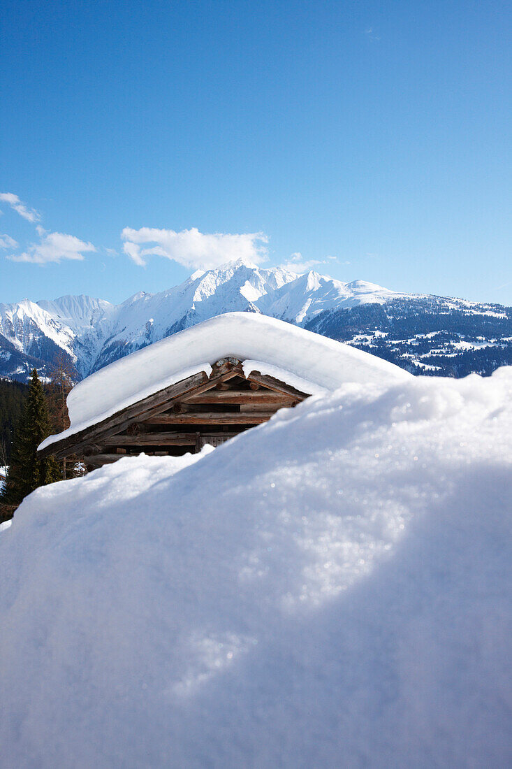 Snow covered hut, Piz Riein, Canton of Grisons, Switzerland
