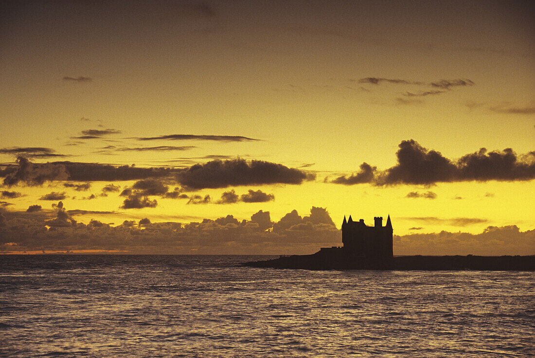 Evening mood with Chateau Turpeau on the waterfront, Cote Sauvage, Quiberon, Brittany, France, Europe