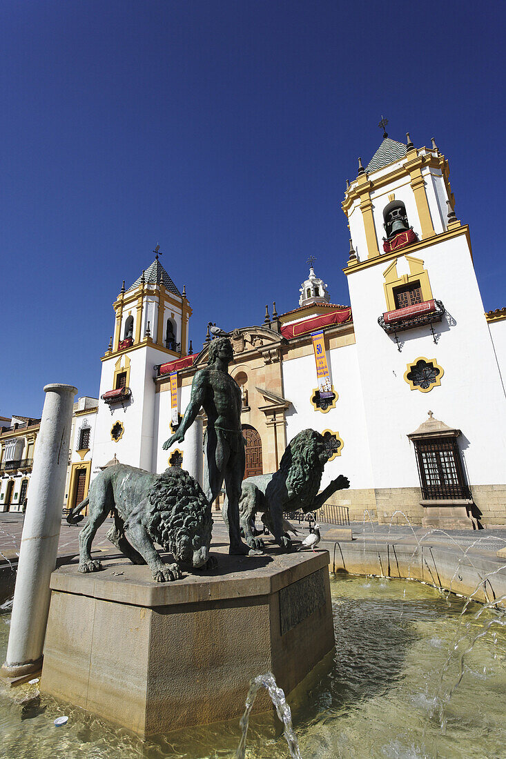 Fountain and church Iglesia del Socorro, Plaza del Socorro, Ronda, Andalusia, Spain