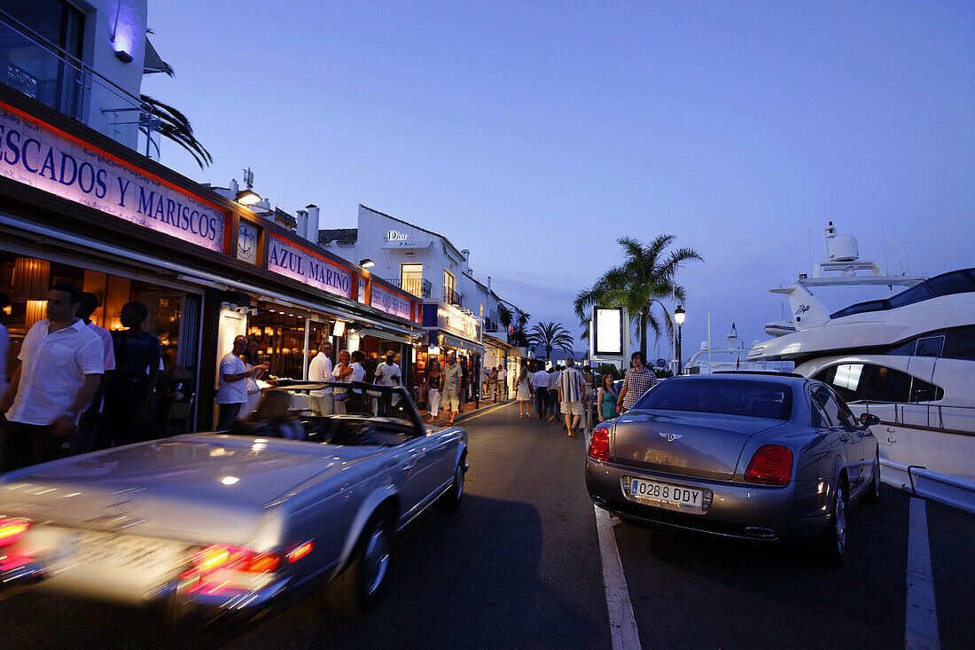 Luxury cars, Restaurants near harbour, Puerto Banus, Marbella, Andalusia, Spain