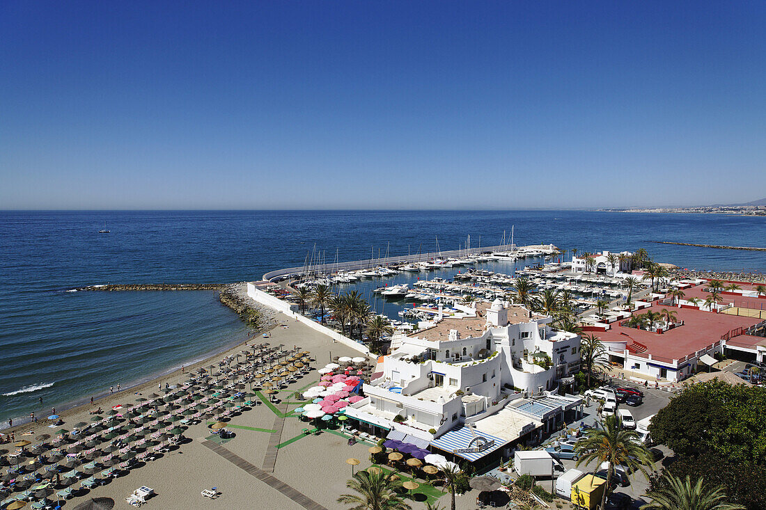 View over beach with marina, Marbella, Andalusia, Spain