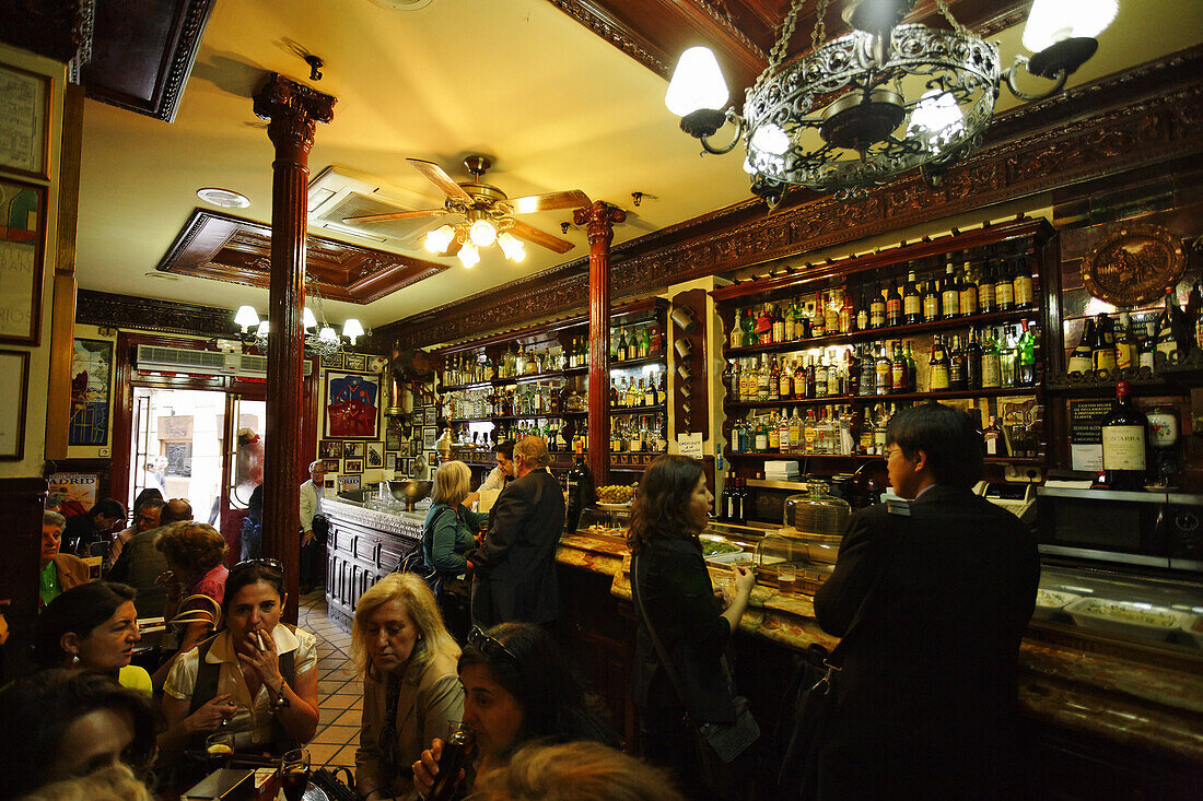 Guests in the old bar Casa Alberto, Calle de Huertas, Madrid, Spain