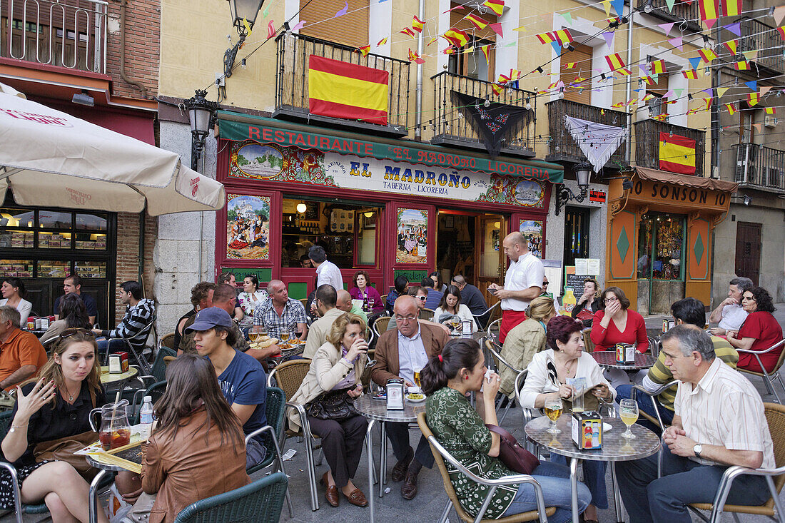Guests in a pavement cafe, Madrid, Spain