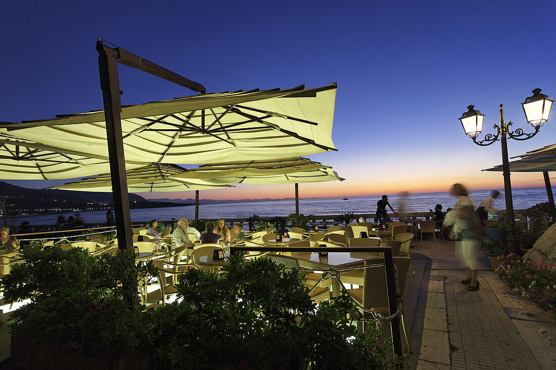 Open-air area of a restaurant near beach, Cefalu, Sicily, Italy