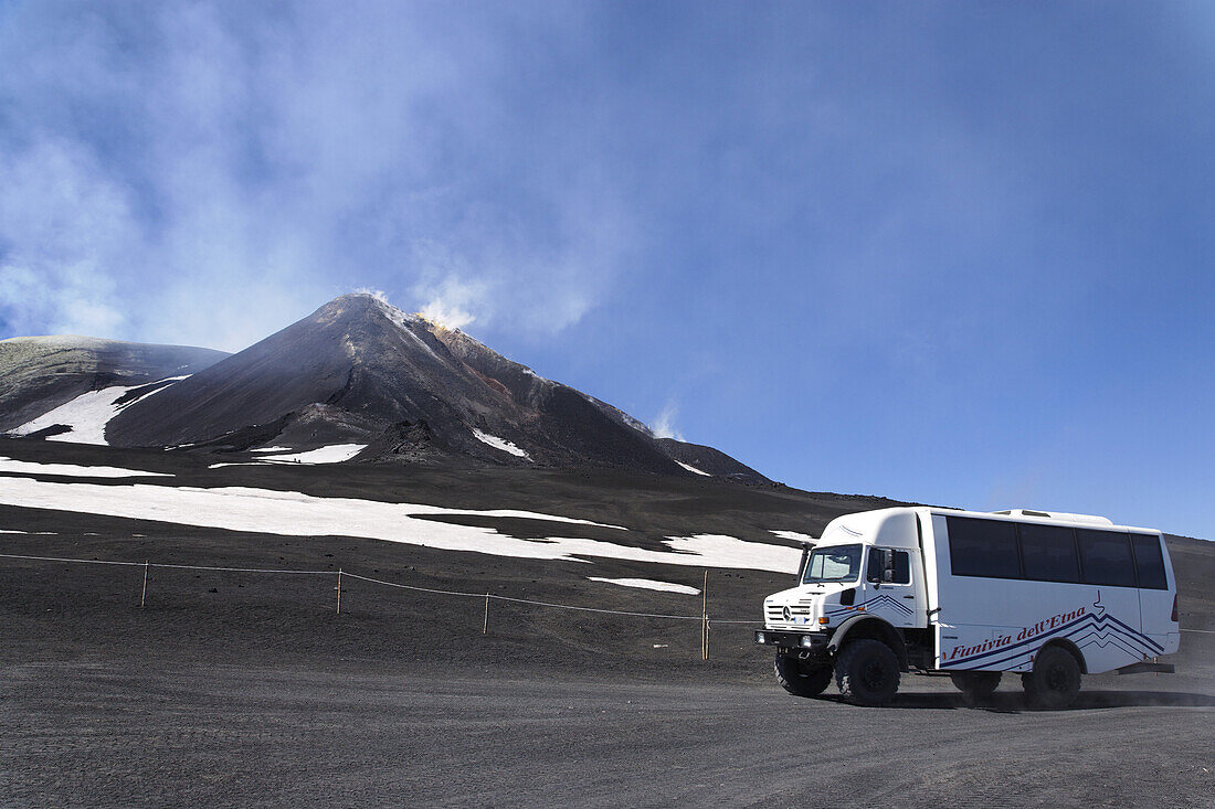 Mount Etna, jeep in foreground, Sicily, Italy