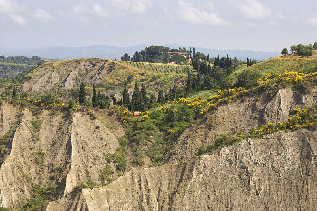 Eroded hills at the Benedictine monastery Monte Olivieto Maggiore, Tuscany, Italy