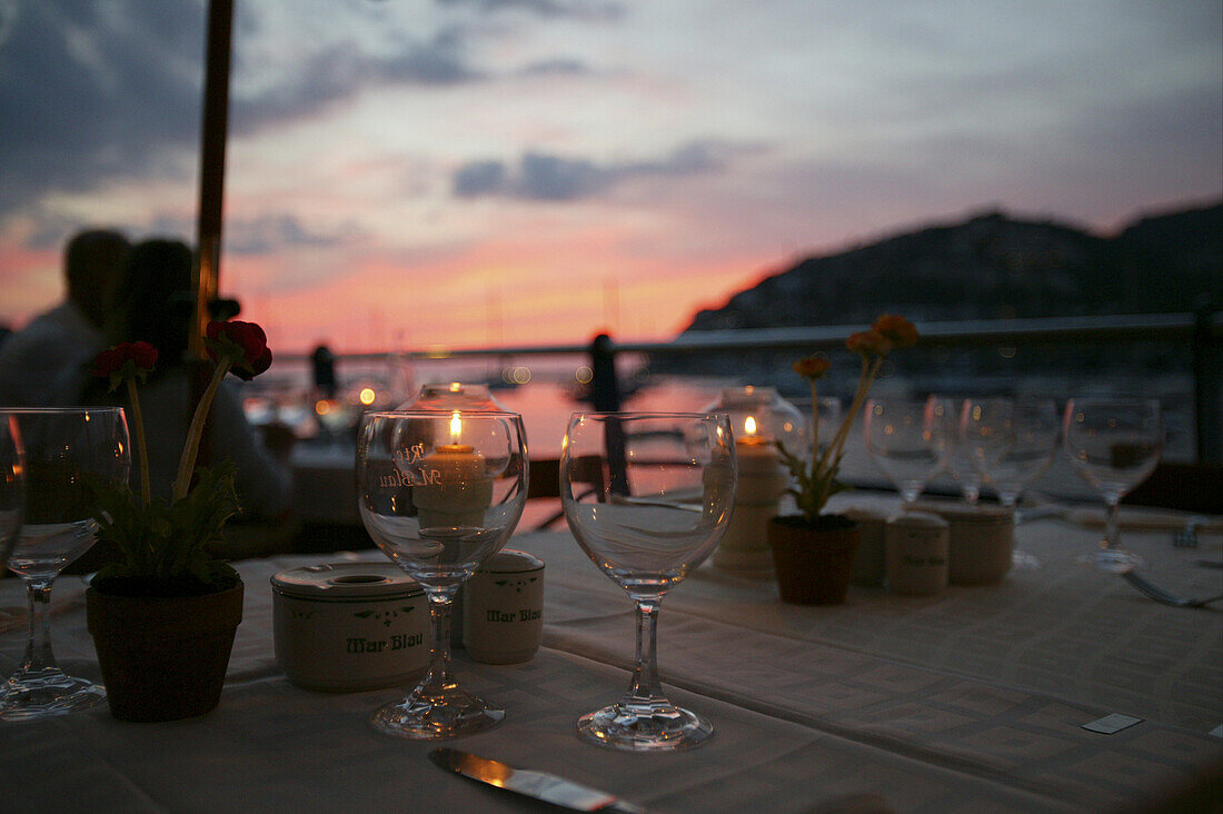 Wein glasses by candlelight, Mar Blau restaurant, Andratx, Mallorca, Balearic Islands, Spain